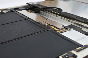 Exploring the inside of a modern tablet, highlighting advanced repair technology.