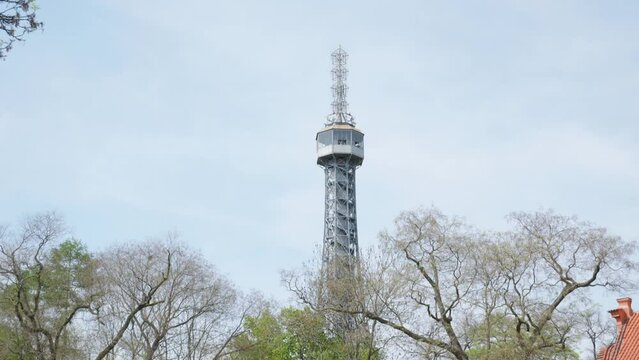 Petrin Lookout Tower in petrin gardens In Prague, Czech Republic, tilt-up shot.