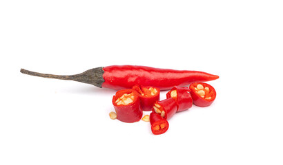 Red chili peppers and sliced chili peppers with seeds on white background