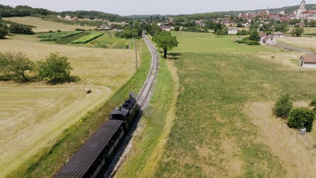 Follow a steam train on a small railroad, a tourist train to discover the Lot region, France