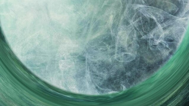 Mist swirl. Glitter smoke. Astrology portal. Shiny white blue green color steam cloud in circle frame vortex abstract background with free space.