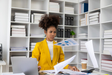 A stressful businesswoman throws papers at a business that doesn't go according to plan, too tired...