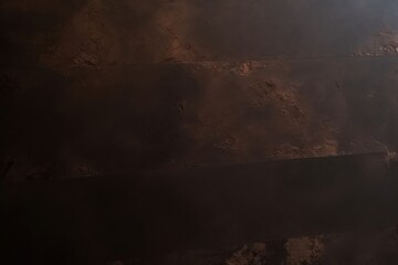 Close up of abstract dark brown stone texture. Brown marble texture background