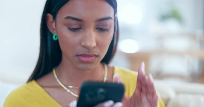 Home, annoyed woman and phone with spam stress and reading phishing text with doubt and frustrated. Confused, mobile glitch and problem from scam notification and error in a living room with scroll