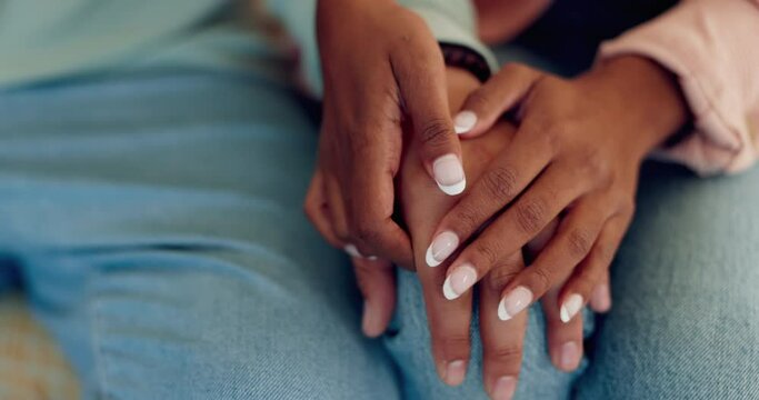 Couple, empathy and holding hands in home for support, care or love of gratitude together. Closeup of man, woman or touch hand of partner for loyalty, commitment or trust of kindness, hope or forgive