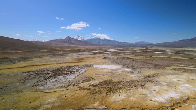 Aerial view over of the scenic Lauca National Park, Chile - dolly reverse, drone shot