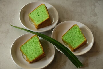 Bolu Pandan or Pandan sponge cake or chiffon cake. Pandanus leaf cake. Indonesian food, Malaysian...