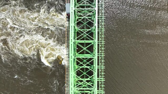 Top down dolly motion over greed bridge.