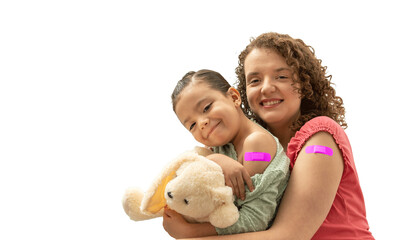 mother and daughter with pink band aid smiling after injection. happy mom and kid showing vaccine...