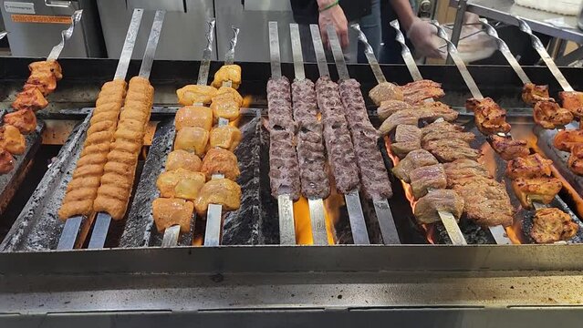 Kebab cooking with chicken, ground beef and lamb 