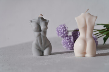Two scented candles in the form of female figures
