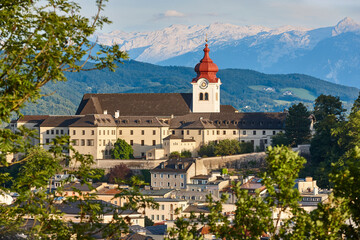 Nonnberg abbey and alpine range in Salzburg. Travel destination. Austria - obrazy, fototapety, plakaty