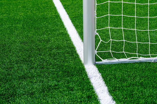 Hockey field, soccer, american football, lacrosse gate detail background over green grass. Horizontal sport poster, greeting cards, headers, website