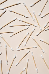 Bamboo cotton ear swabs layout in neutral colours.