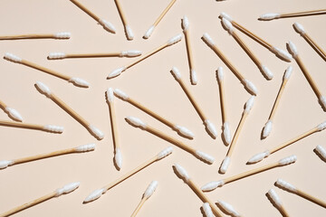 Bamboo cotton ear swabs layout in neutral colours.