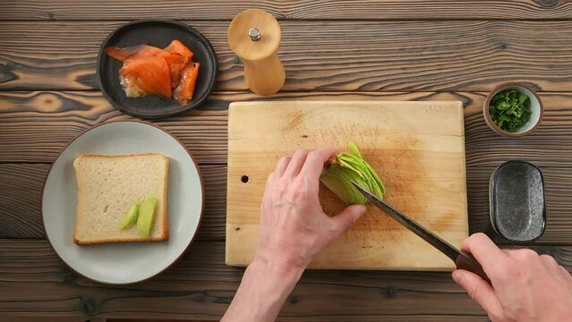 Cut avocado on slices for making sandwich
