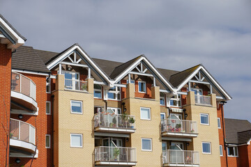 Residential building exterior. apartment block with balconies. property and housing 