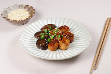 Stir Fried King Oyster Mushrooms. Grilled Slices of King Oyster Mushrooms.