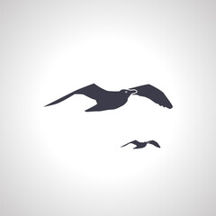 Fototapeta premium flying seagull silhouette. flock of seagull flying isolated icon