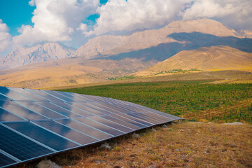 Solar panel on the background of mountains.  green energy for life concept. sustainable development...