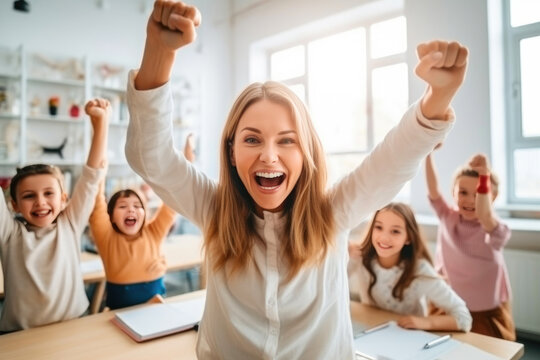 Teacher and Joyful Students Celebrate Successful School Project