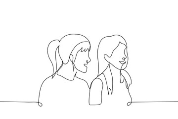 women stand nearby and smile look away - one line art vector. concept of girlfriend, sister or lovers enjoy each other