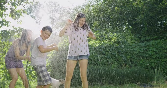 kid, mother, hose, water, child, outdoor, family, summer, garden, fun, people, girl, splash, happy, spray, joy, grass, childhood, parent, sprinkler, playing, happiness, green, mom, woman, leisure, dro
