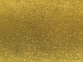 Golden light glitter image use as texture or background.
