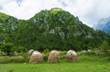 Balls of hay for the animals in the meadow