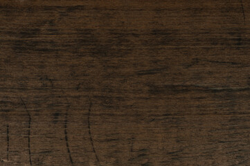 Old wooden table top view. Scratched textured surface.