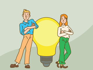 Young business woman  standing with light bulb. Concept of creativity.