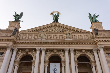 Fototapeta na wymiar Dome of the church with a cross. City Lviv. Flag of Ukraine.