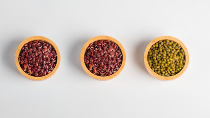 Mung beans and Red kidney beans in a basket wooden on white background