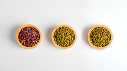 Mung beans and Red kidney beans in a basket wooden on white background