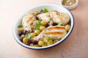 Grilled chicken with grape and basil