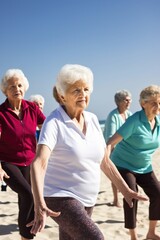 portrait of a group of seniors doing an exercise routine on the beach