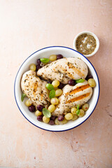 Grilled chicken with grape and basil