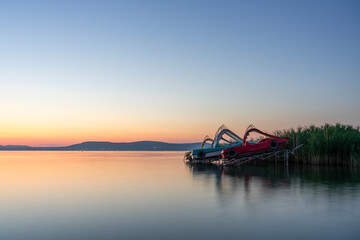 paddle boat funny activity in the sunset with a slide on the lake Balaton in Hungary