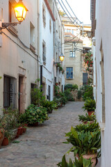 Picturesque Cobblestone Street in Tossa de Mar's Old Town