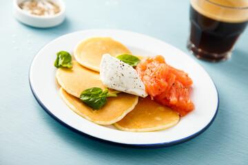 Savory pancakes with salmon and cream cheese