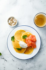 Savory pancakes with salmon and cream cheese