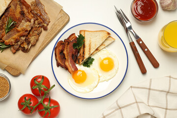 Tasty breakfast and delicious meat food concept - fried bacon