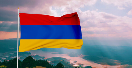 Armenia national flag cloth fabric waving on beautiful grey sky Background.