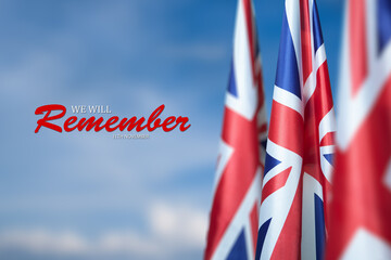 Flag of Great Britain with Text on background of blue sky. Holidays of the UK. Remembrance Day.