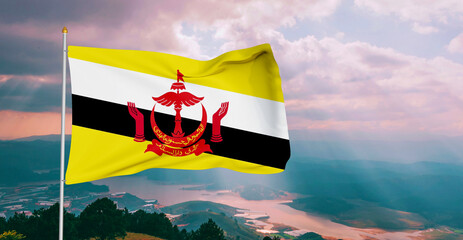 Brunei national flag cloth fabric waving on beautiful grey sky Background.