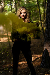 A Lovely Blonde Model Poses Outdoor While Enjoying The Fall Weather