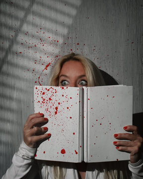 Women Reading Scary Murder Mystery Book