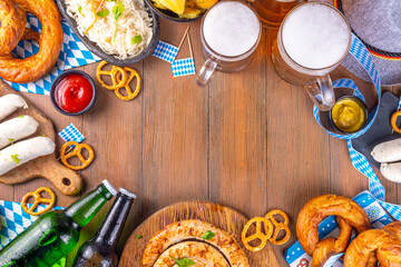  Oktoberfest munich traditional festival menu foods - bavarian sausages, pretzels, potato, sauerkraut, beer bottle and mug,  Background flyer for Oktoberfest invitation on old wooden table
