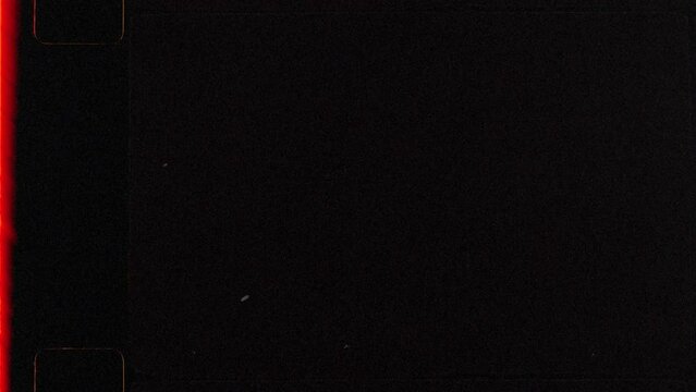 Vintage Super 8mm film frame overlay with a sprocket hole, dirt, hair, scratches, light leaks and grain in a seamless loop. Instant film border, analog film negative, film strip, filmmaker overlays