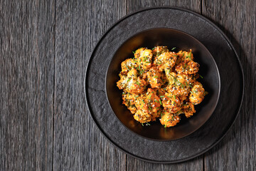 bang bang broccoli bites in bowl, top view